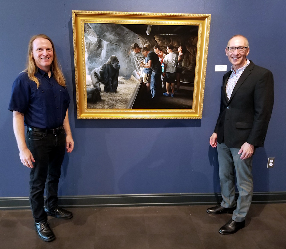 Artist Kevin Grass and gallerist Paul Calendrillo flank Kevin's "Primates" painting