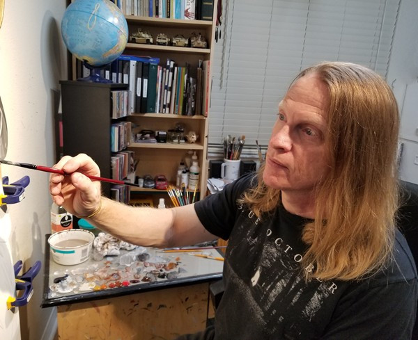 Kevin Grass starting a new painting commission.