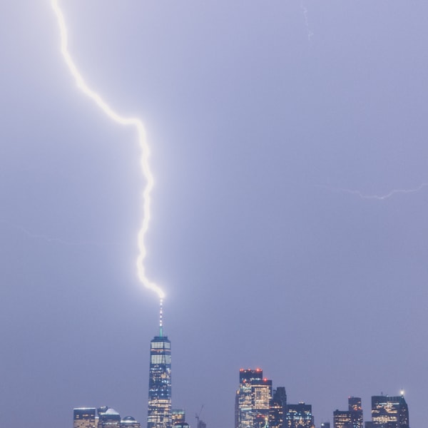 Massive lightning bolt touching the top of the World Trade center