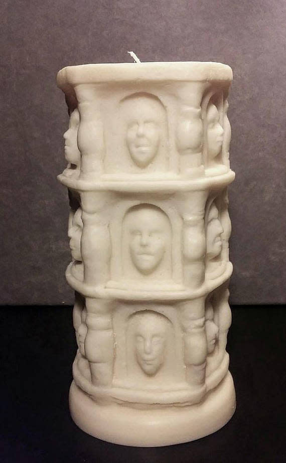 many faced candle