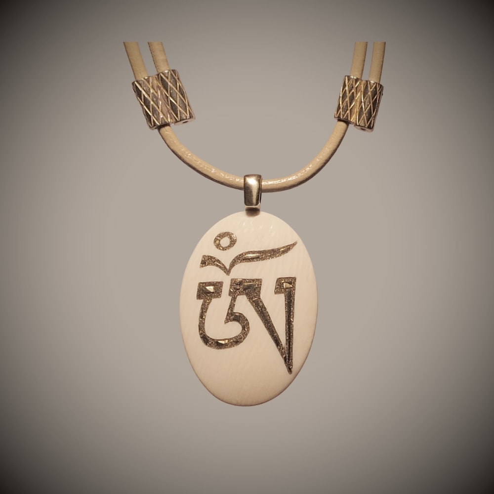 Tibetan om pendant top