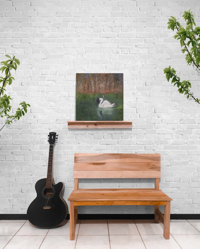 Guitar next to wooden bench seat