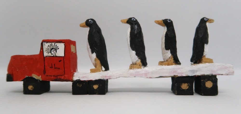 jlovato taos art company woodcarving miniatures truck 4 penguins