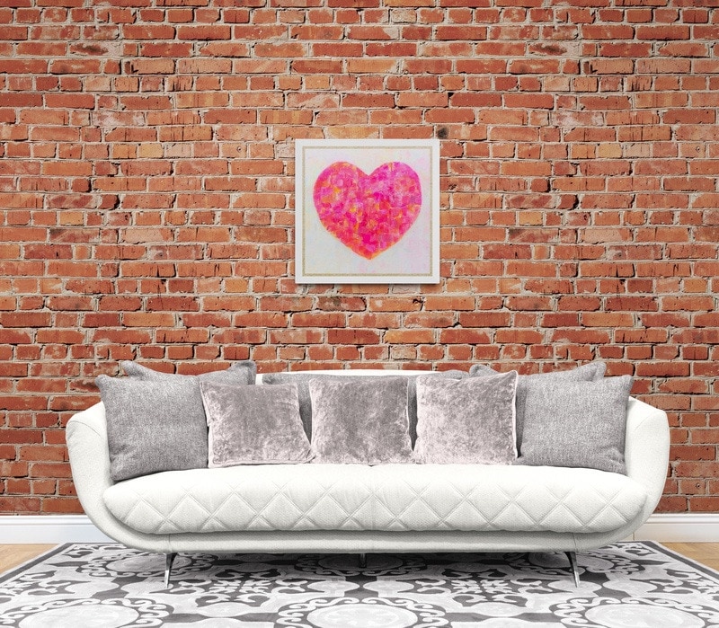 Orange heart in brick wall mock up 