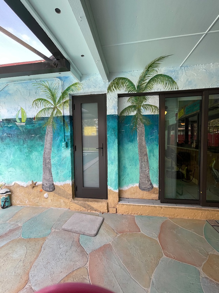 Ocean Mural and Palm trees