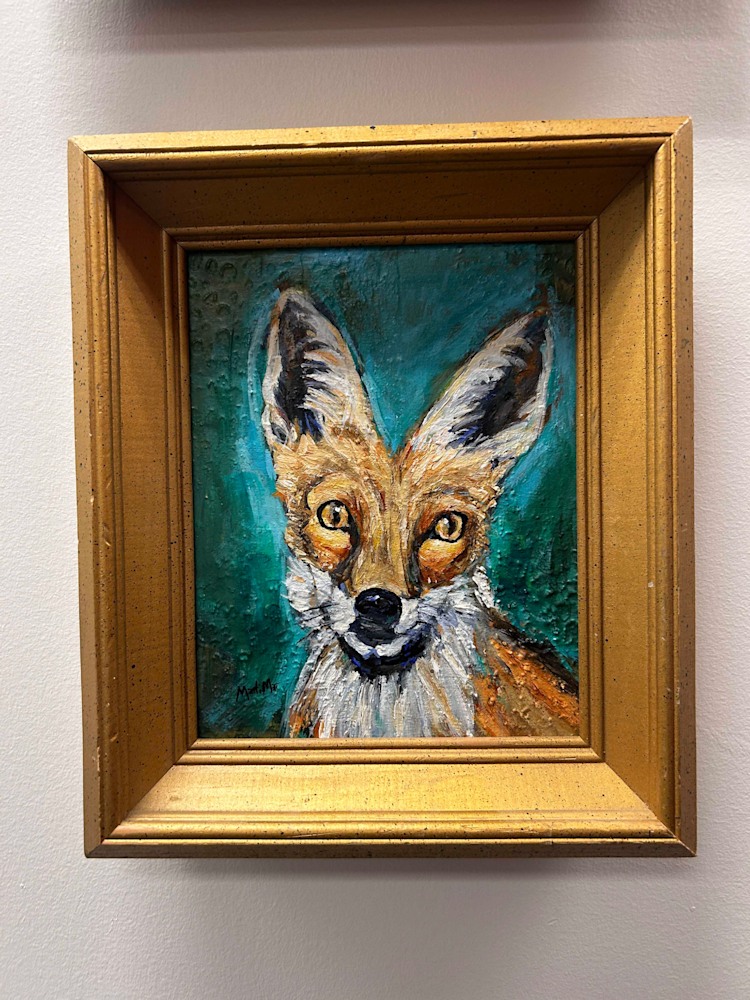 Green fox in frame