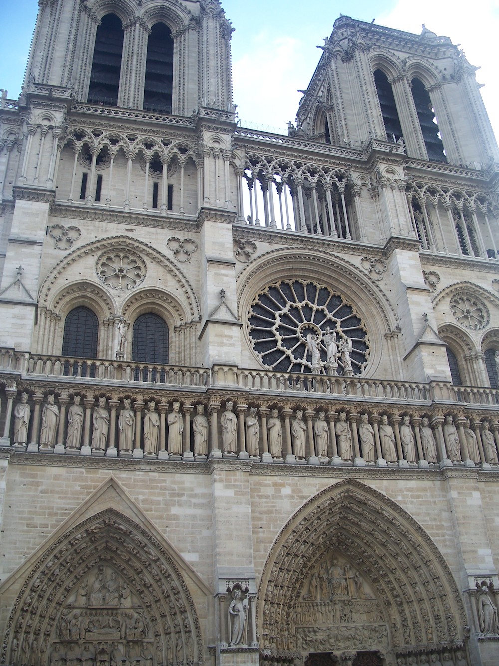 The Rose window and twin towers of the front of the Cathedral of Notre Dame in Paris