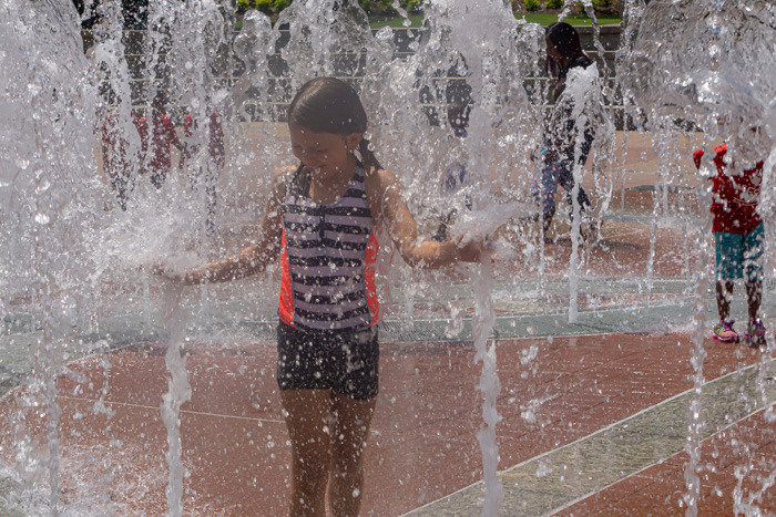 A photo of my niece playing in the Centennial Park fountain