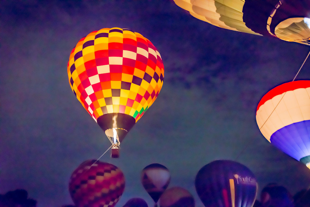 A brightly glowing hot-air balloon at Piedmont Park in Atlanta