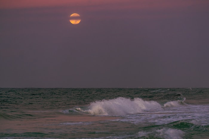 Full moon over the ocean in Destin