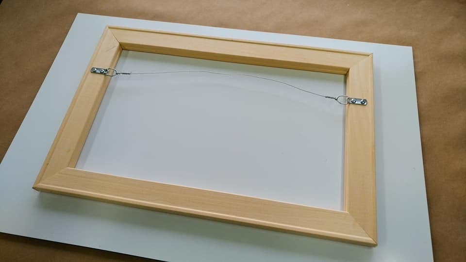 Acrylic Face mount hangs on a 3/4" inset frame on back with hanging hardware