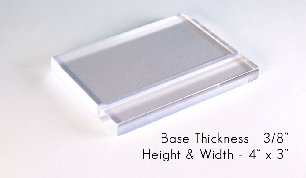 an image of a white shadowy surface with an illuminated clear 3/8 inch acrylic base, clearly lit, with a text at the bottom right stating the base thickness - 3/8 inch, and dimension - 4" x 3"