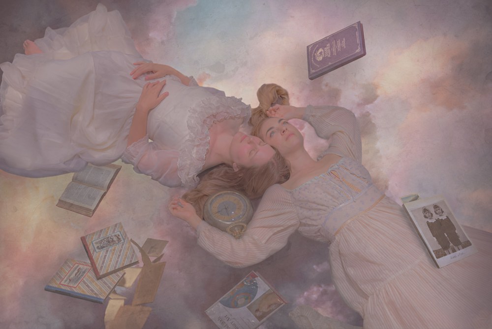 A photo of two girls floating in the heavens, entitled Les Jumeaux des Anges (Angel Twins)