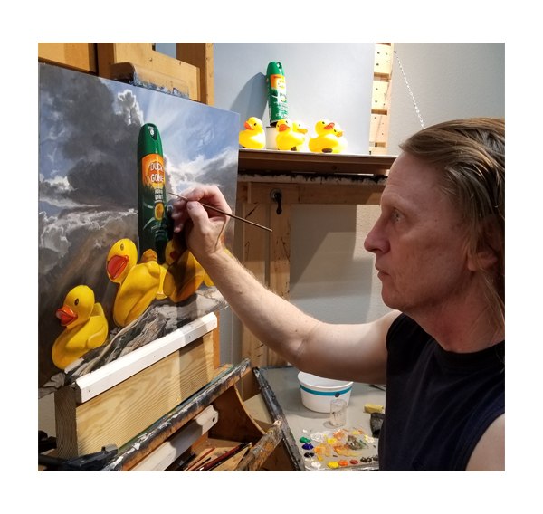 Kevin Grass painting his "Duck Off" painting