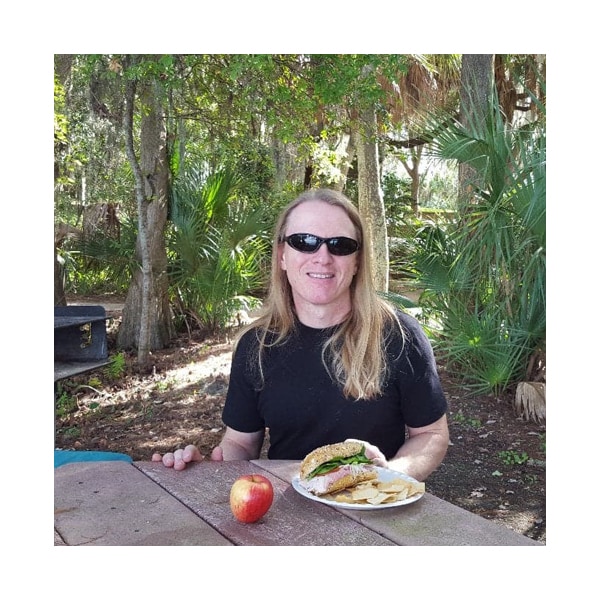 Artist Kevin Grass at a picnic in Anderson Park, Florida.