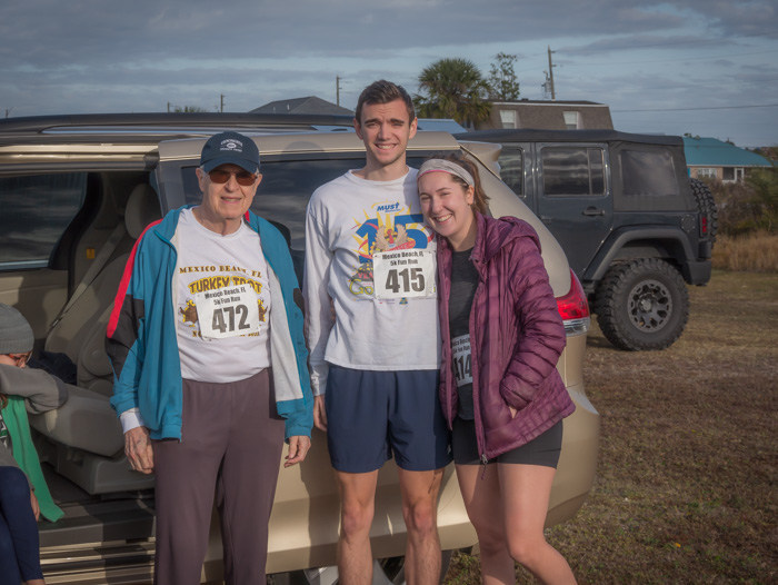 My dad, daughter, and her boyfriend before the 5k on Thanksgiving