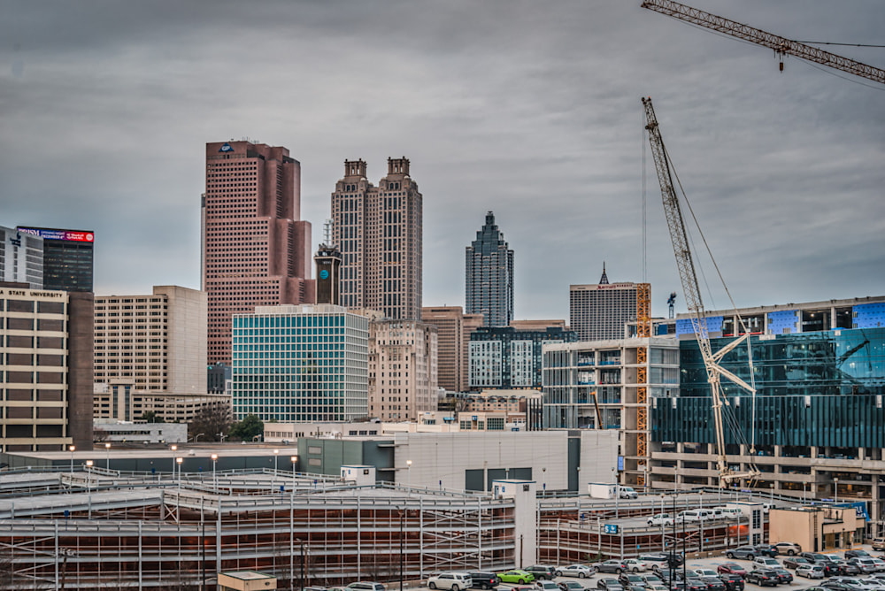 A parking garage and the Atlanta skyline on a gray afternoon