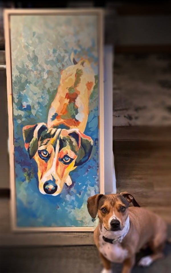Roxy the rescue in front of her portrait!