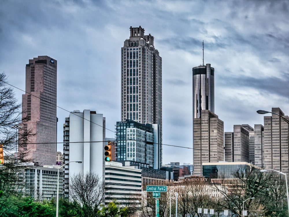 The tall buildings of Atlanta as seen from the ground from about a mile away on a cloudy gray day