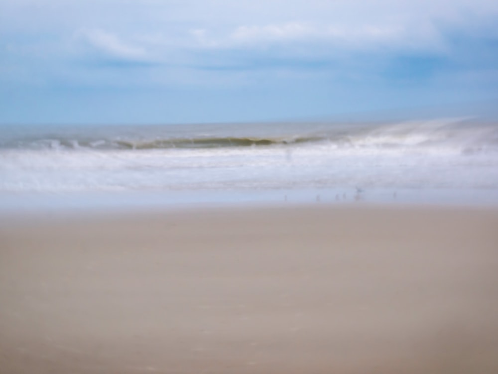 An beach scene with intentional camera movement giving it an ethereal look