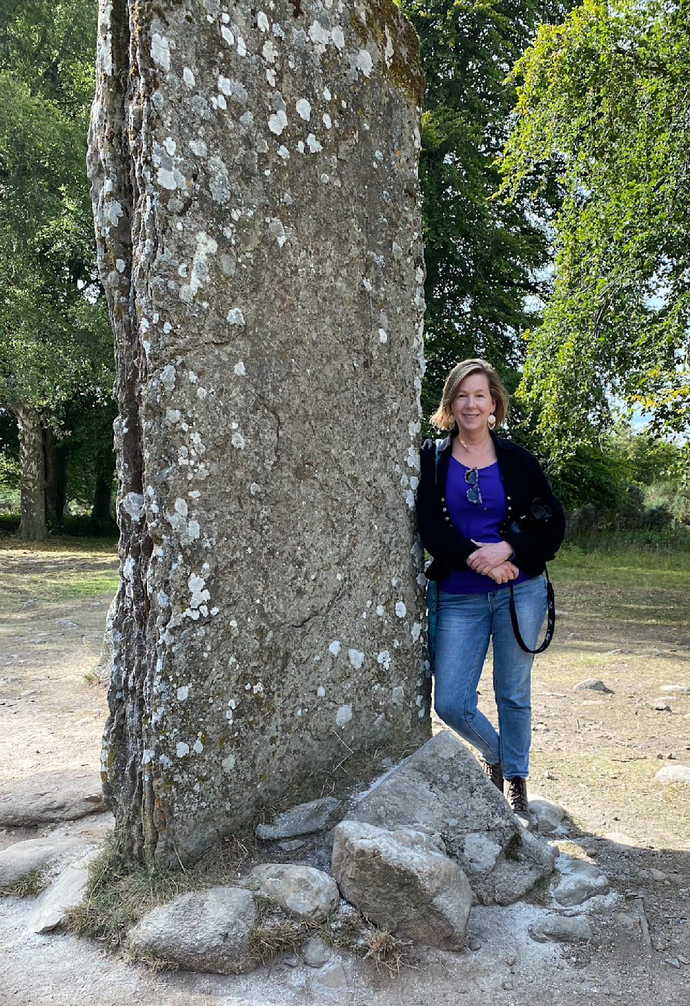Me standing in front of one of the stones at Clava Cairns