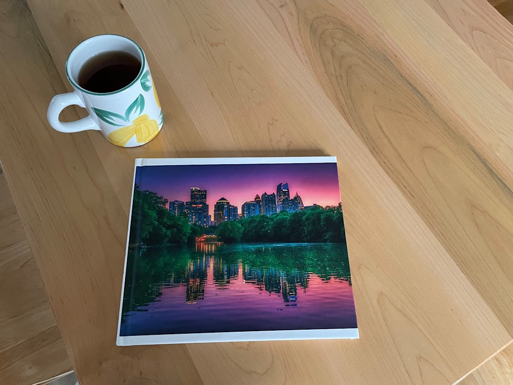 A cup of tea with a photo book