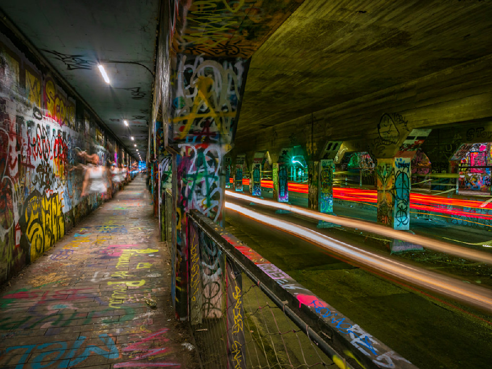 An Atlanta photographer capturing long-exposure shots in Krog Street Tunnel in Atlanta