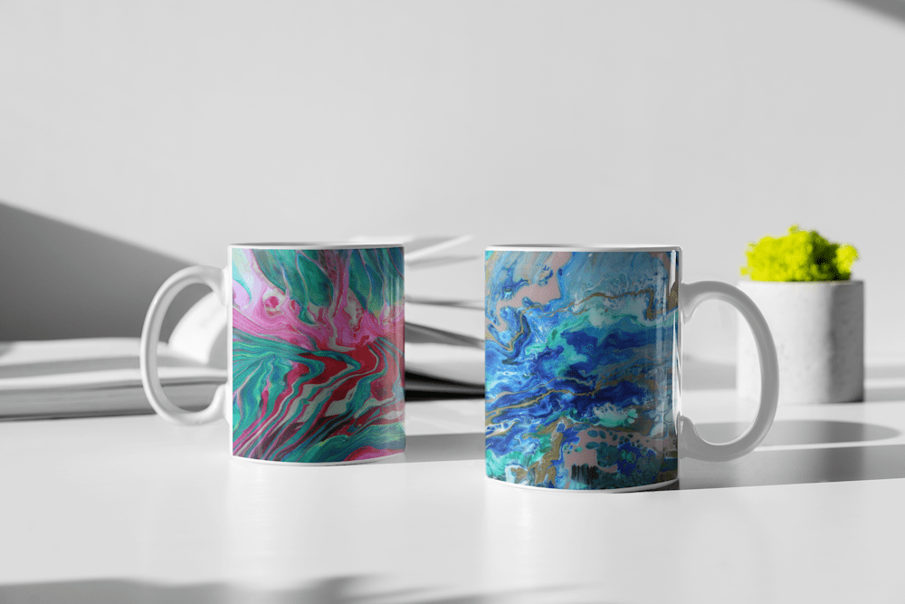 Two mugs shown on a counter.