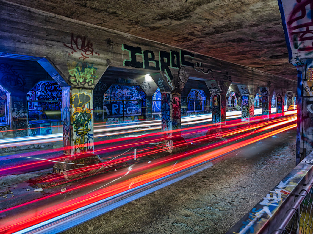 An Atlanta photographer capturing light trails in Krog Street Tunnel