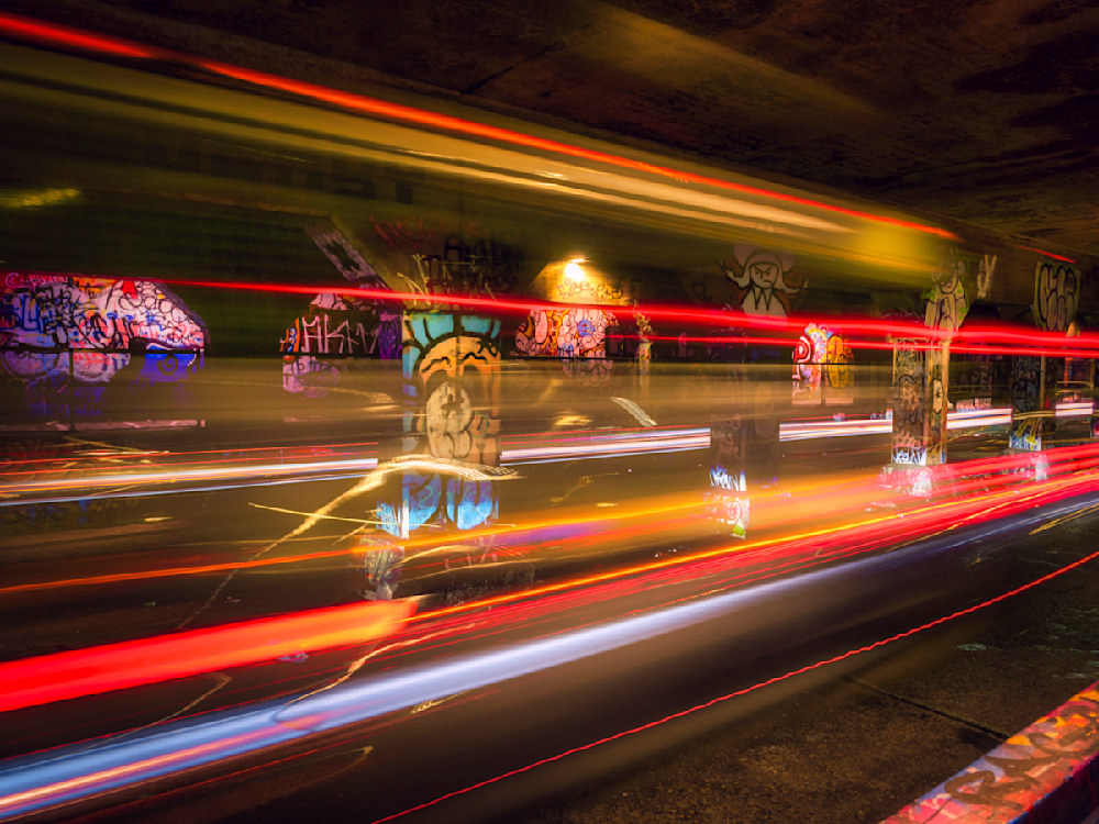 An Atlanta photographer captures the light trails of a bus in the Krog Street Tunnel