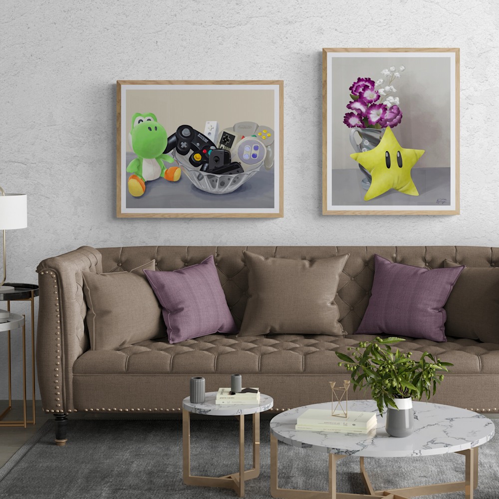 "Yoshi's Controller Collection" seen framed hanging on the wall next to "Invincible Flowers", also framed.
