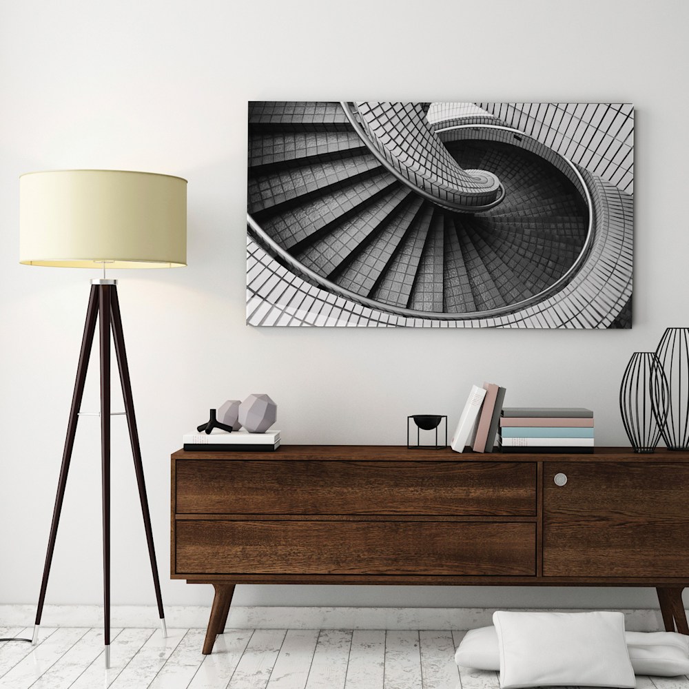A black and white gloss metal print on the wall.