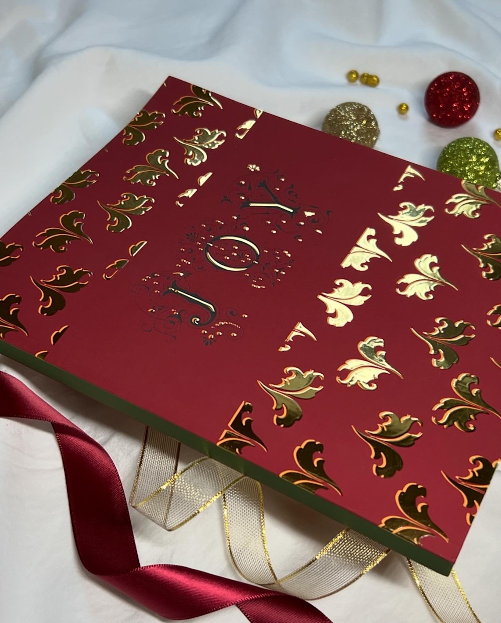 Luxury red mixed media sketchbook with gold foil JOY design, created by artist Sonia J. Pal at ASquareWatermelon