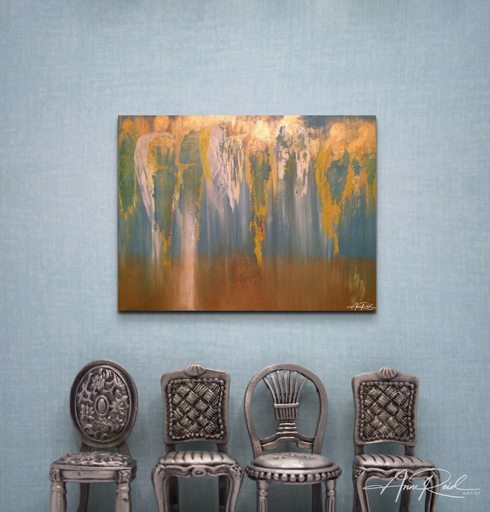 Abstract angelic forms in gold and teal above vintage chairs in soft blue boho room