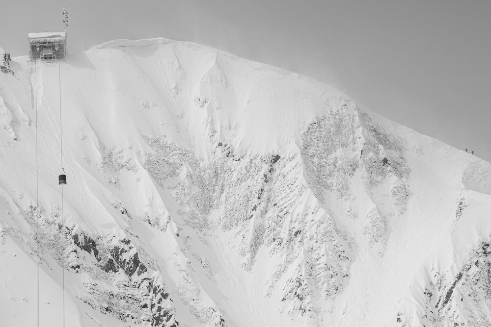 A cold winter morning at Big Sky Resort in Montana. The original tram to take people to the top of the mountain can be seen in this image. It has since been replaced.