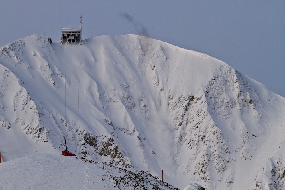 A cold winter morning at Big Sky Resort in Montana. The original tram to take people to the top of the mountain can be seen in this image. It has since been replaced.