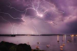 Branching lightning over Casco Bay with sailboats – fine art storm print