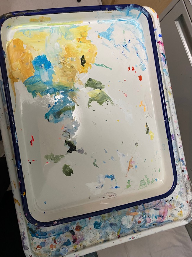 Paint tray close-up — palette in process