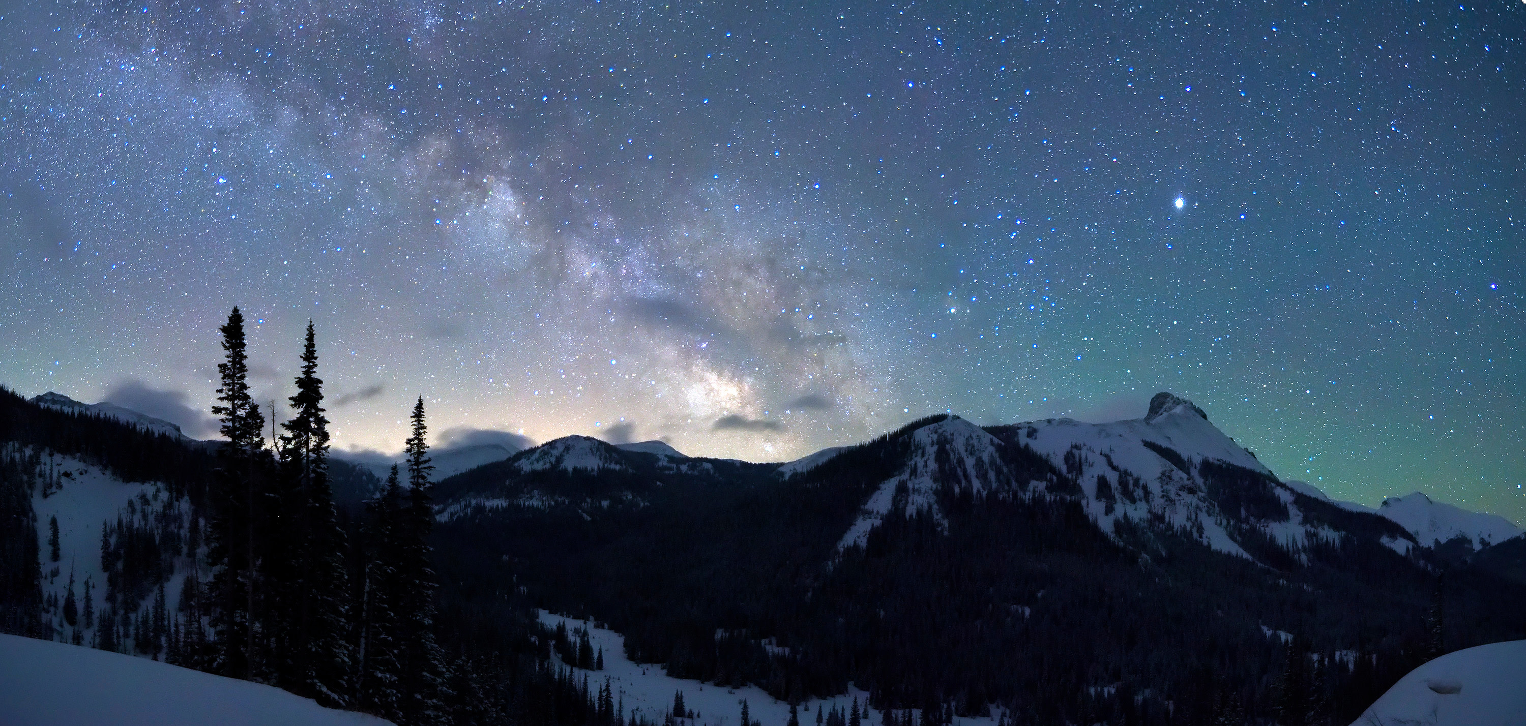 
        <div class='title'>
          Never Summer Milky Way
        </div>
       
        <div class='description'>
          Viewed from a pullout on Colorado Highway 14 just west of Cameron Pass, the Milky Way rises into the night sky over the Never Summer Mountains. This panoramic view looks southward towards Rocky Mountain National Park.
        </div>
      