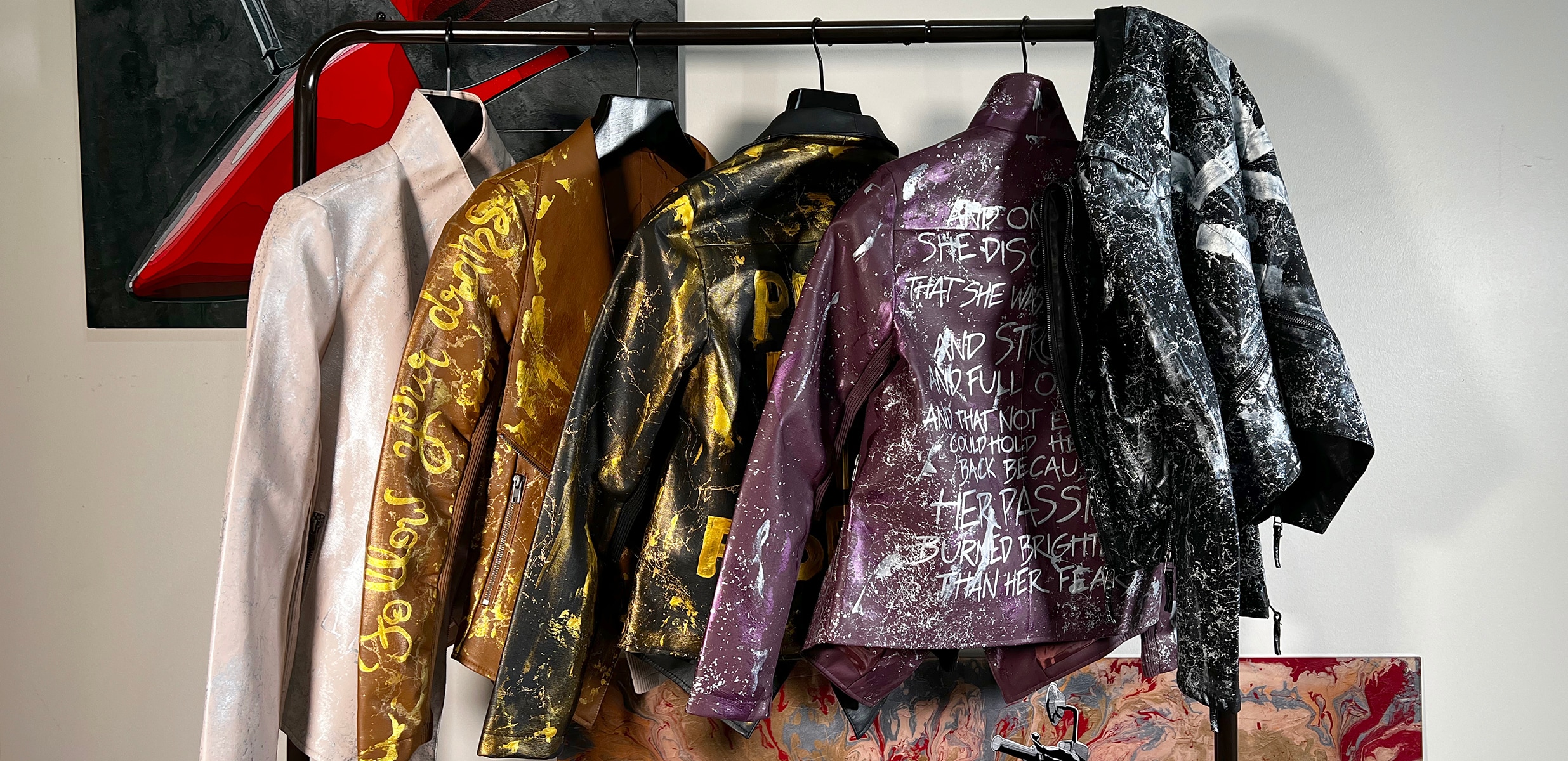 
        <div class='title'>
          hand painted leather jackets ineffable art revi ferrer
        </div>
       