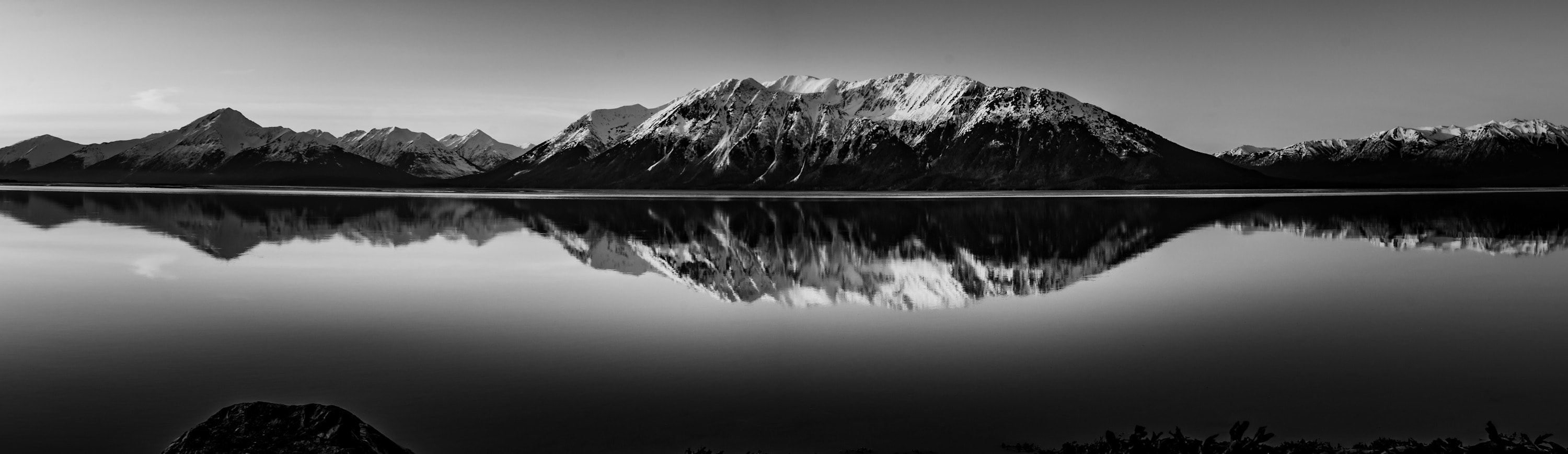 
        <div class='title'>
          Kenai Mountains reflection black and white
        </div>
       