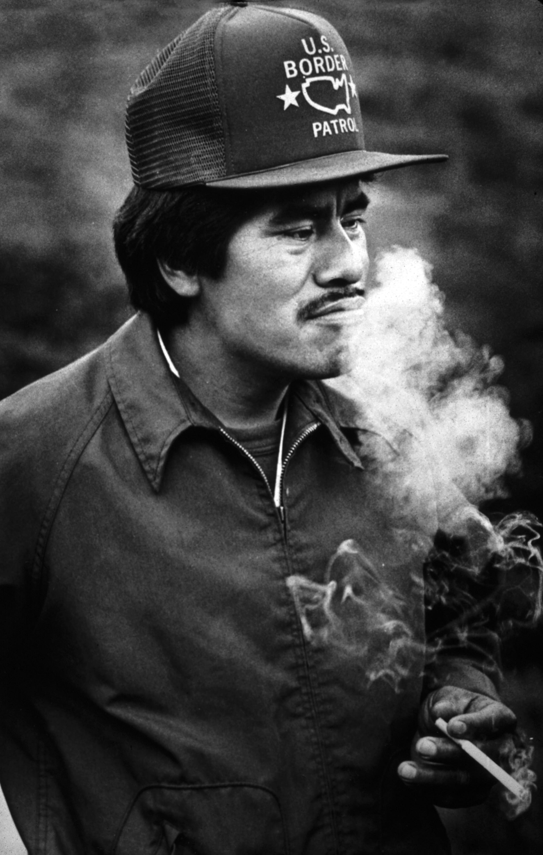 
        <div class='title'>
          Migrant worker smoking@0
        </div>
       