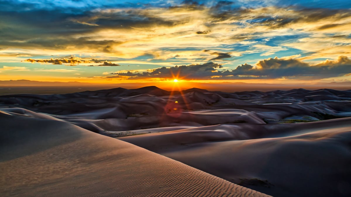 
        <div class='title'>
          Great Sand Dunes Sunset
        </div>
       