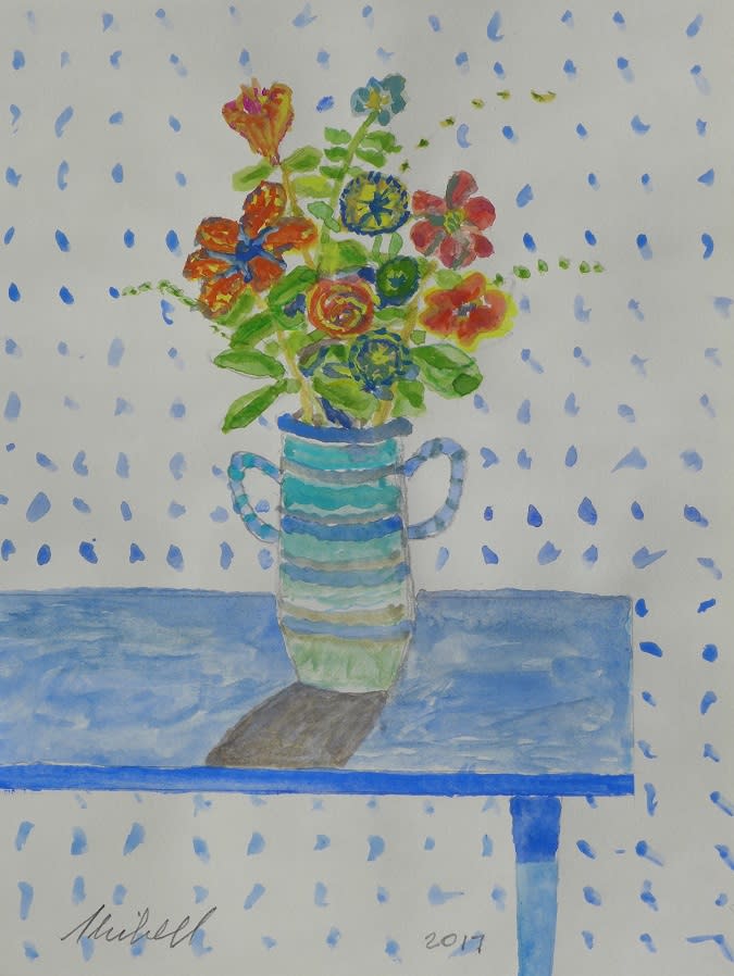 Flowers in blue vase on blue table skibell lvw3jw