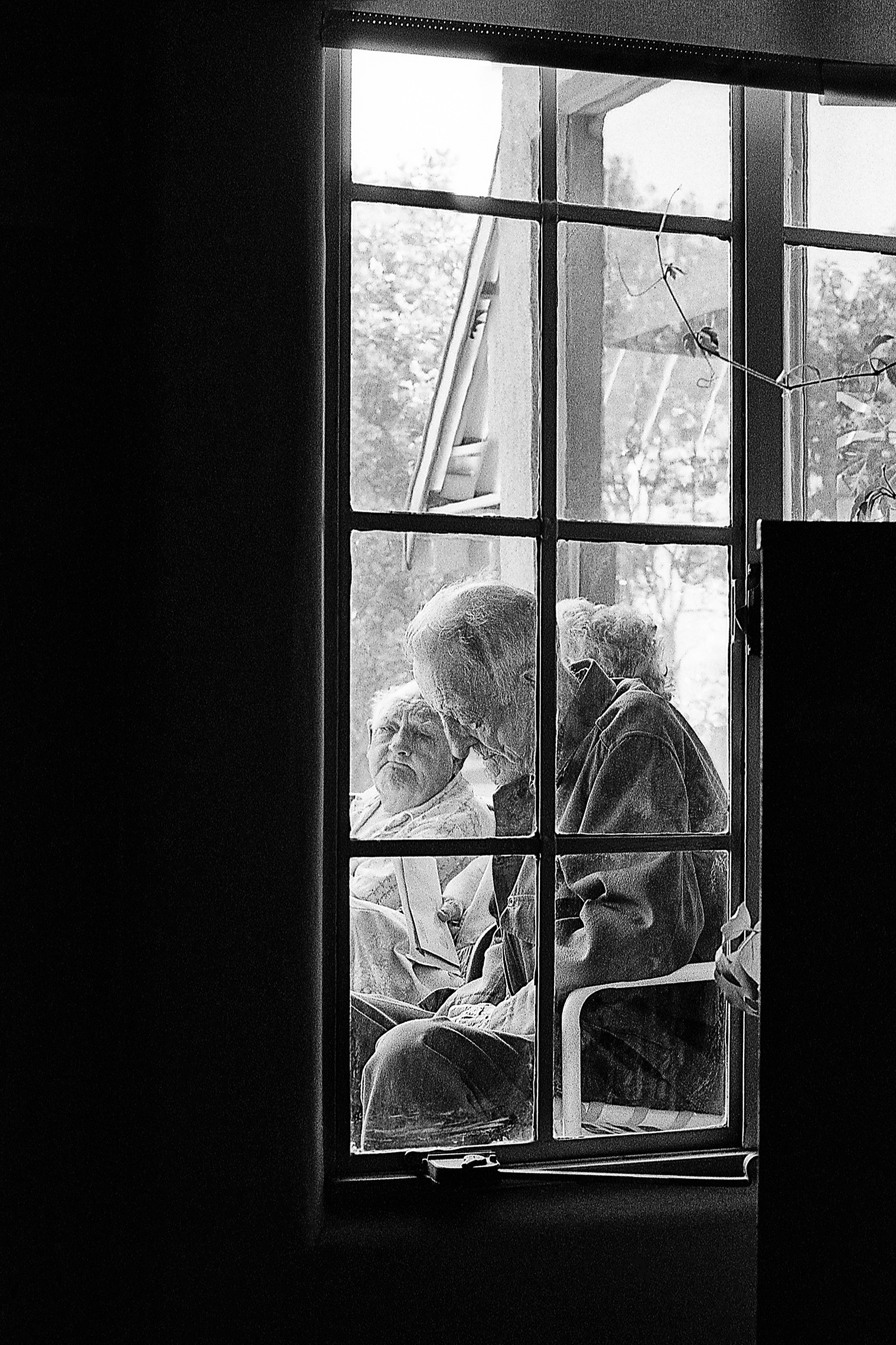 Old men in window copy 2 adtxnu