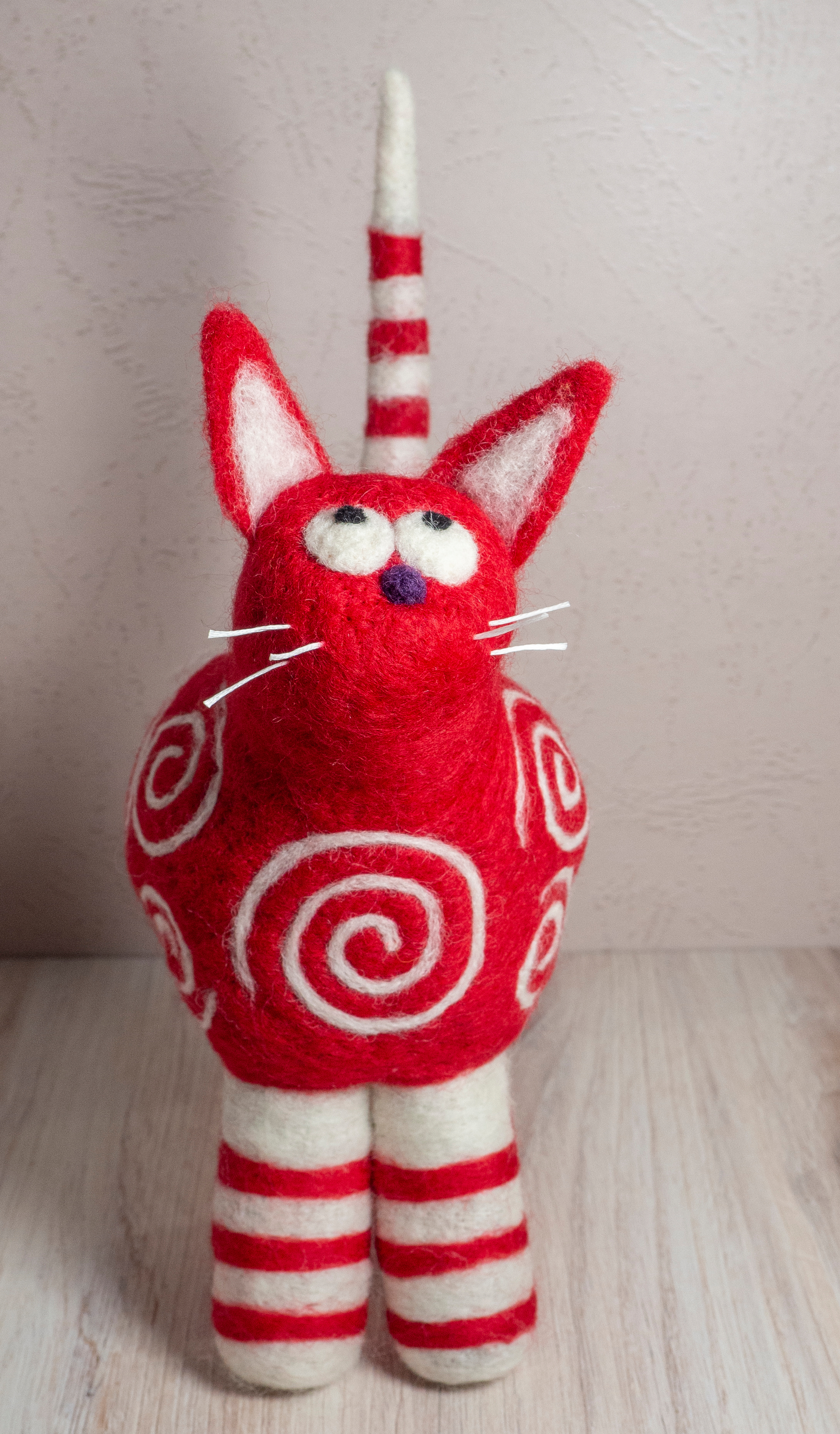 Red and white swirl cat fbccbn