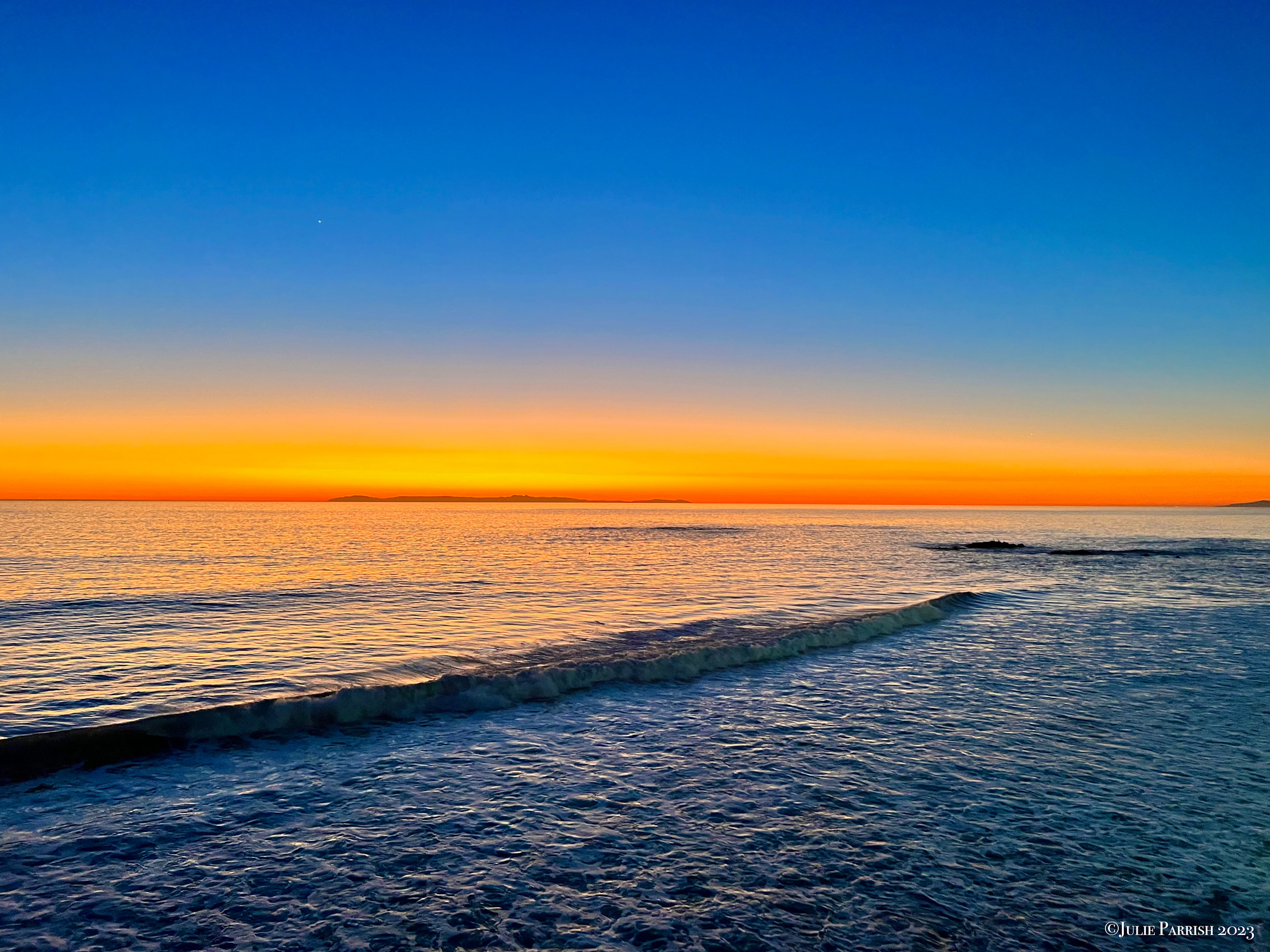
        <div class='title'>
          Julie Parrish Long Beach Sunset Magic
        </div>
       
        <div class='description'>
          
        </div>
      