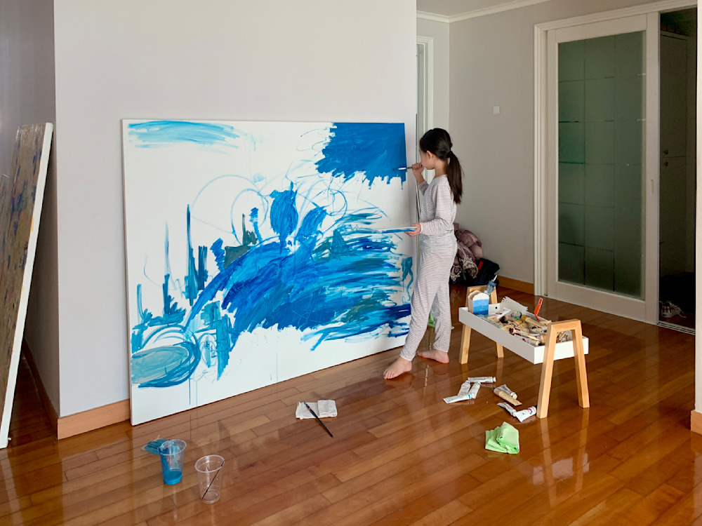 My Daughter Hijacking My Painting, Painting it in Blue All Over