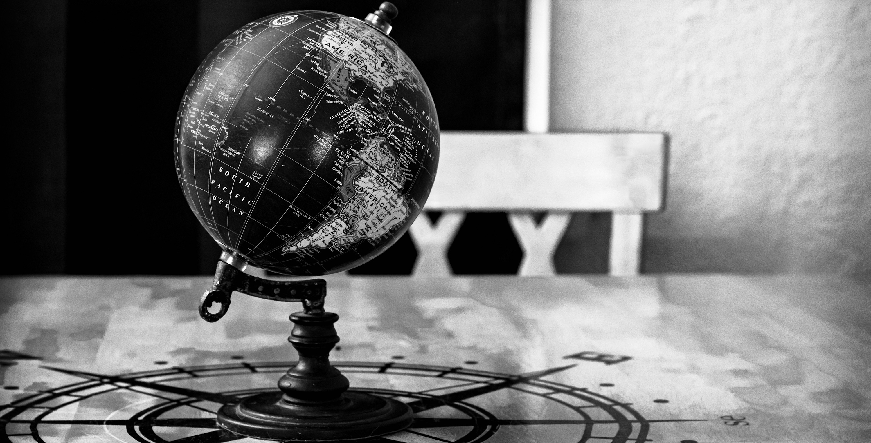 
        <div class='title'>
          Globe and Compass
        </div>
       