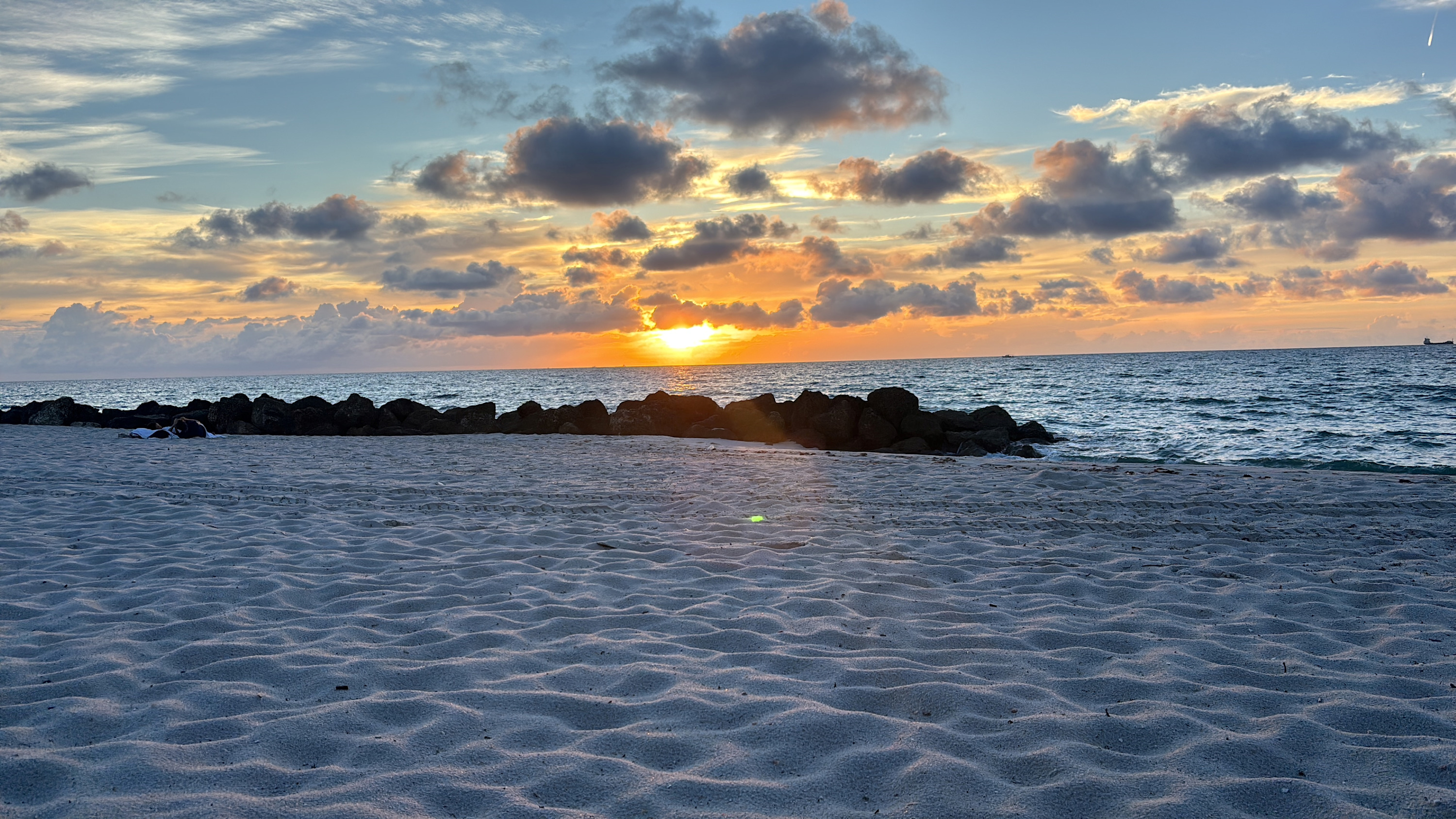 
        <div class='title'>
          Miami Beach Tip Sunrise
        </div>
       